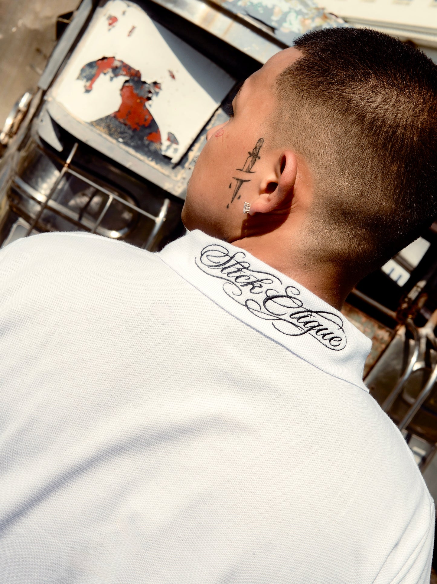 SLICK CLIQUE GHETTO SCRIPT WHITE POLO SHIRT