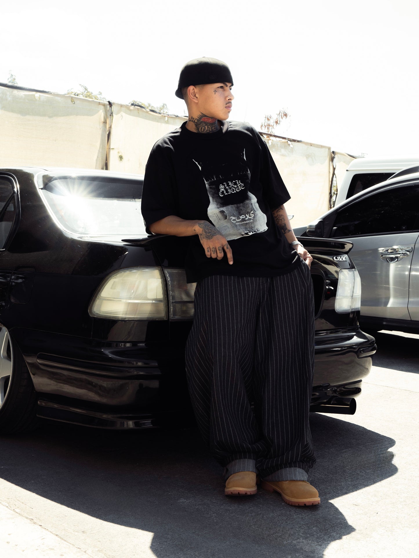 SLICK CLIQUE BULLETPROOF VEST TEE
